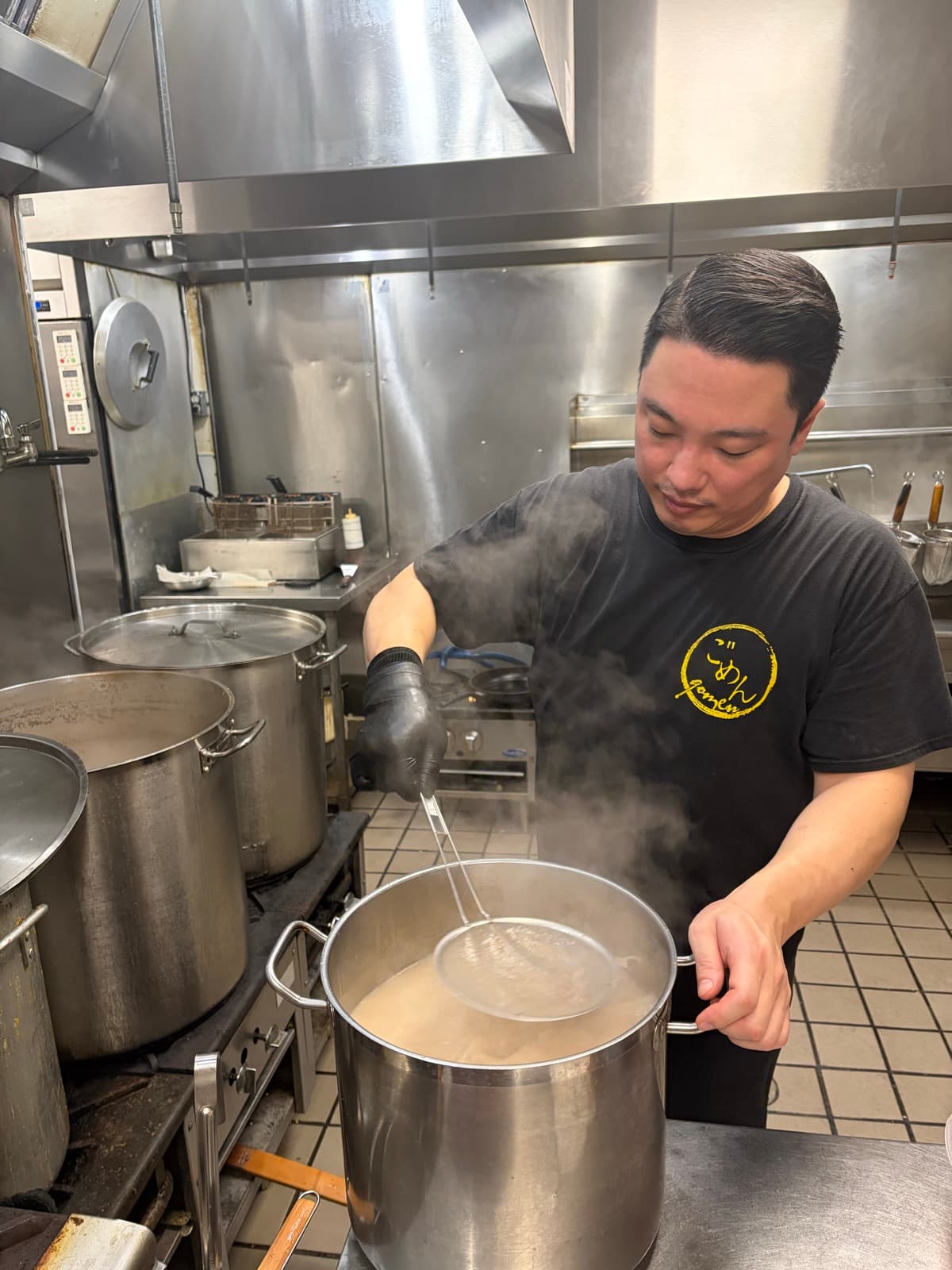 Skimming pork-bone broth in the Gomen kitchen
