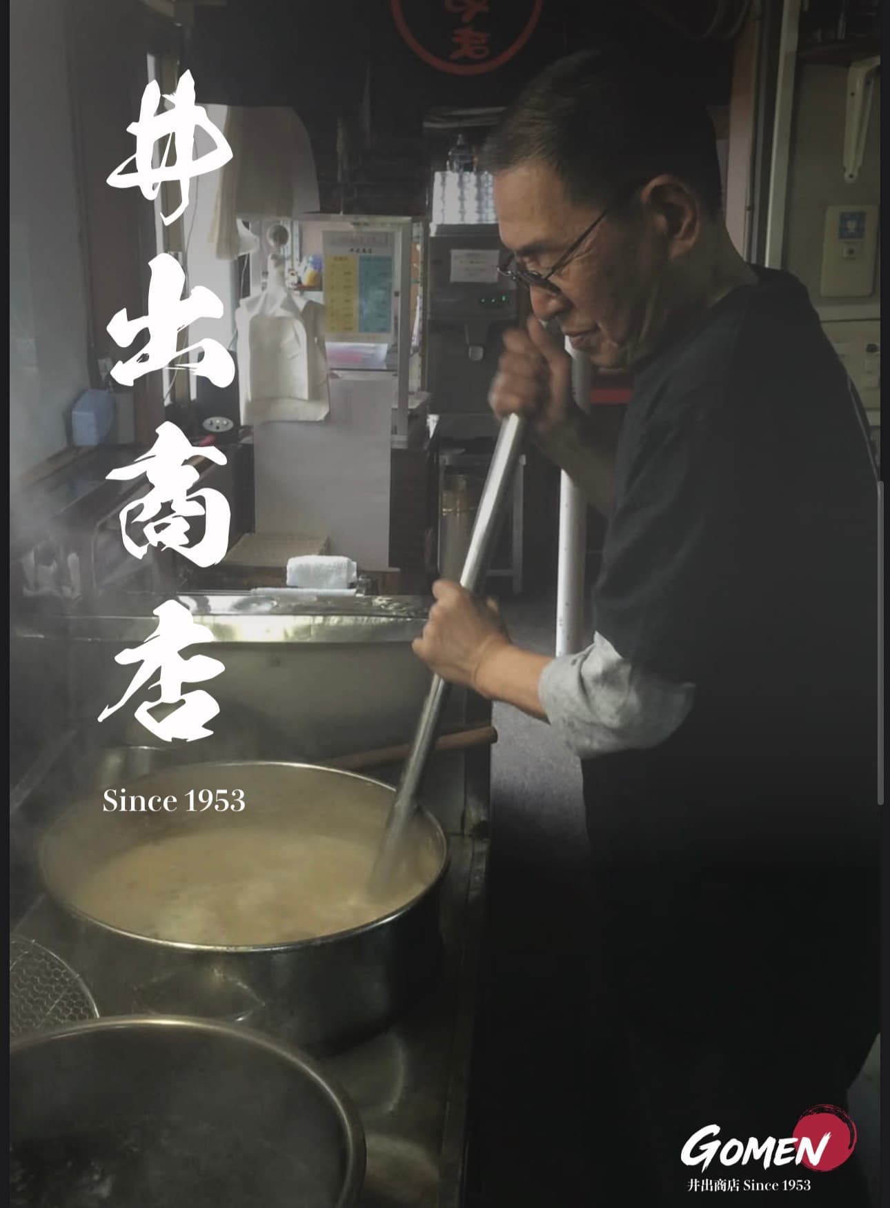 Stirring a tall stockpot of pork-bone broth in the Gomen Ramen kitchen.